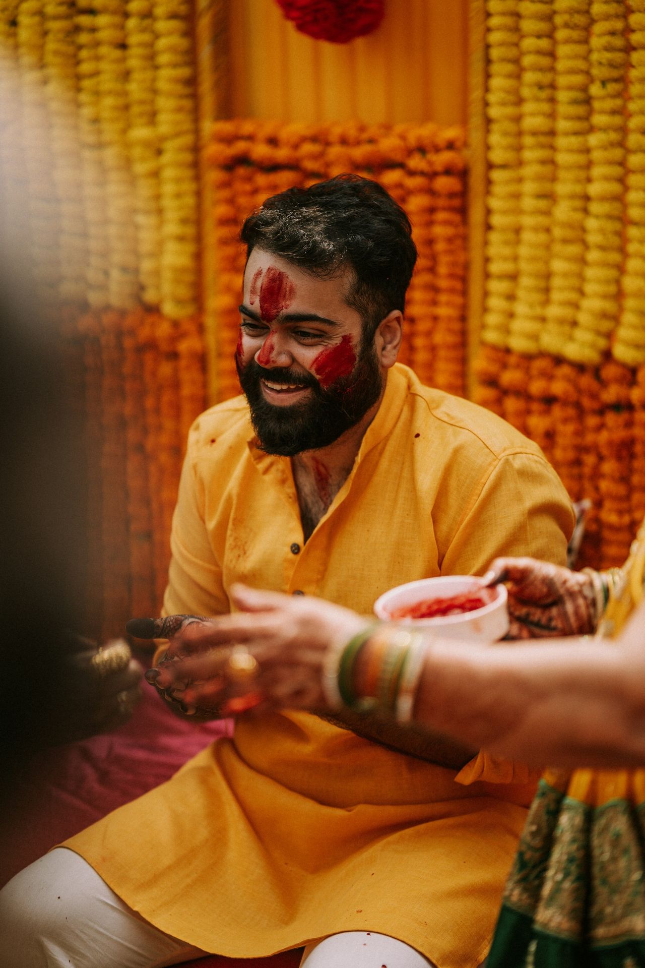 a man in a yellow outfit and a woman in a yellow dress